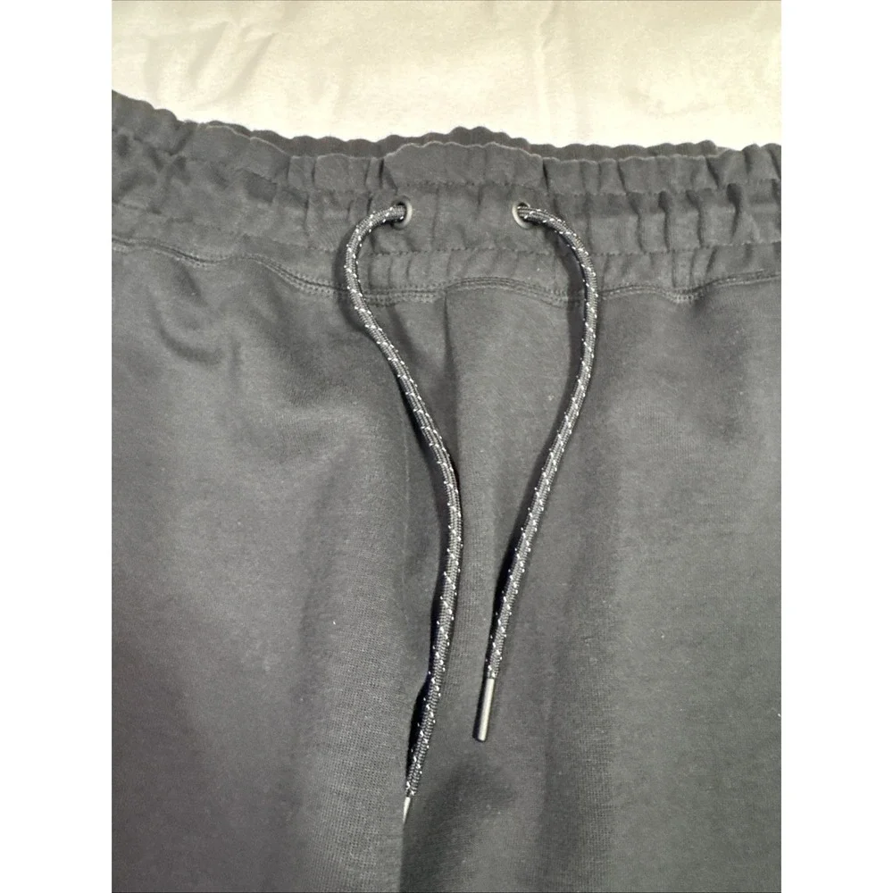 Nike Tech Fleece Joggers Mens M Black Tapered Zip Pocket Sweatpants